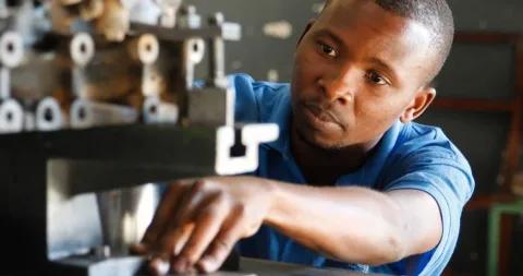 Technical trainee at a workshop machine